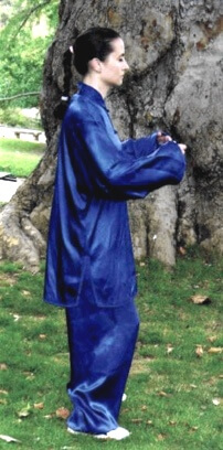 Victoria Windholtz meditating in standing position